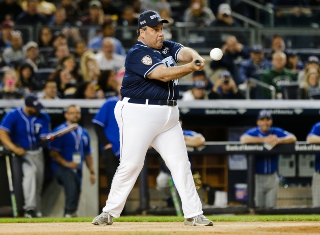 New Jersey Gov. Chris Christie bats during the first inning of the True Blue benefit celebrity softball game at Yankee Stadium on Wednesday, June 3, 2015, in New York. (AP Photo/Frank Franklin II)